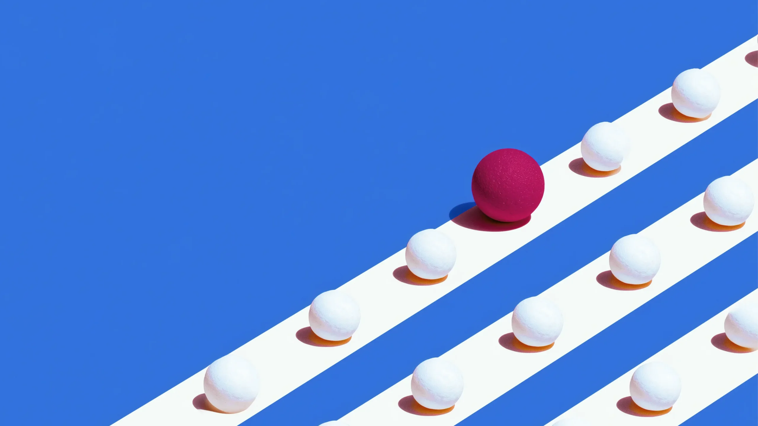 Blue sky-blue background with diagonal white stripes and a single magenta ball among white spherical objects.