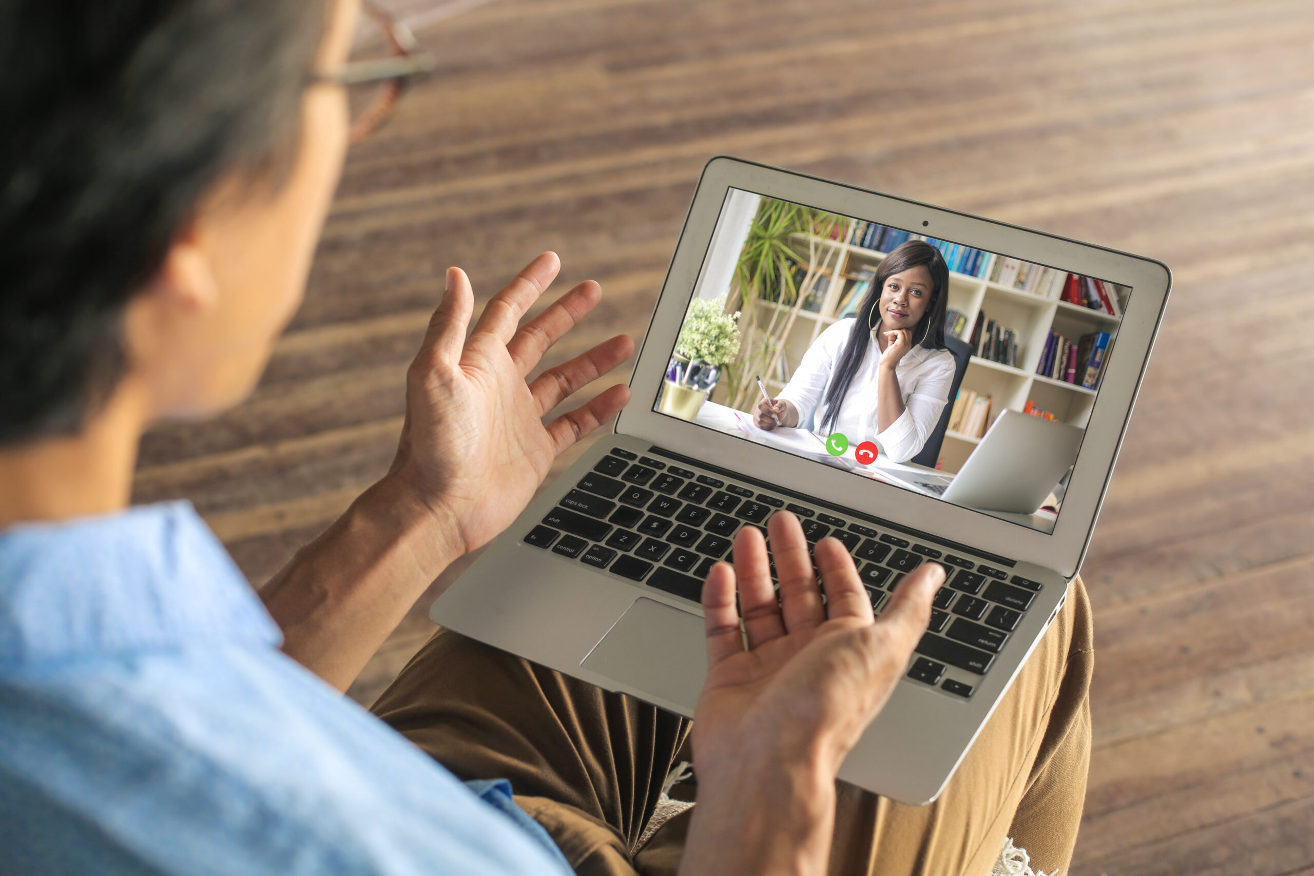 Person having a video interview on their laptop