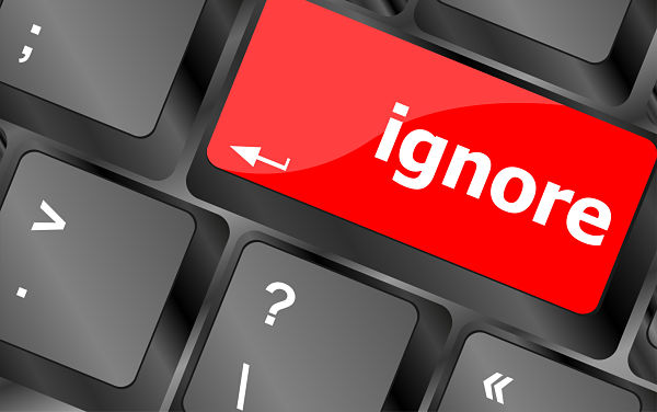 Red keyboard key labeled 'ignore' in white, surrounded by dark gray keys.