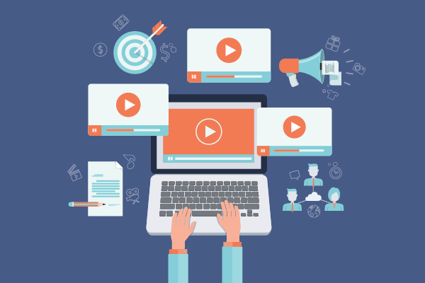 Person typing on a laptop with floating video thumbnails around, symbolizing online video marketing.