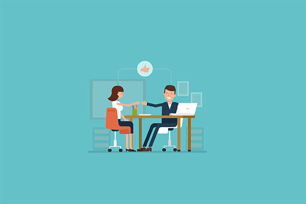 Two coworkers shake hands across a desk in a modern office, a thumbs-up icon above signifying agreement or approval.