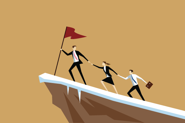 Three businesspeople climb a steep cliff toward a red flag at the top: one reaches back to help another, while the third follows with a briefcase, symbolizing teamwork and leadership