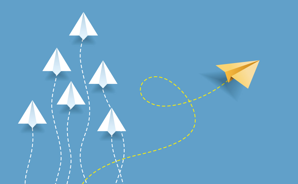 Blue background with multiple white paper planes and dashed trails; a yellow plane travels off to the right.