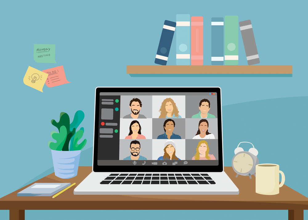 Laptop on a wooden desk shows a video conference with nine participants in a grid, surrounded by a plant, notes, clock, and mug.